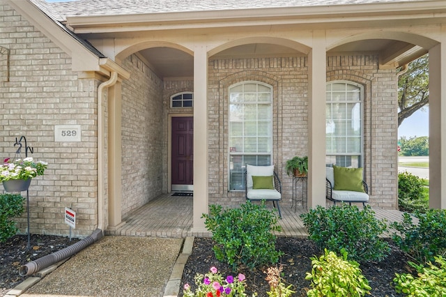 529 Colgate Dr, Allen, TX 75013 - doorway to property featuring a porch and brick siding