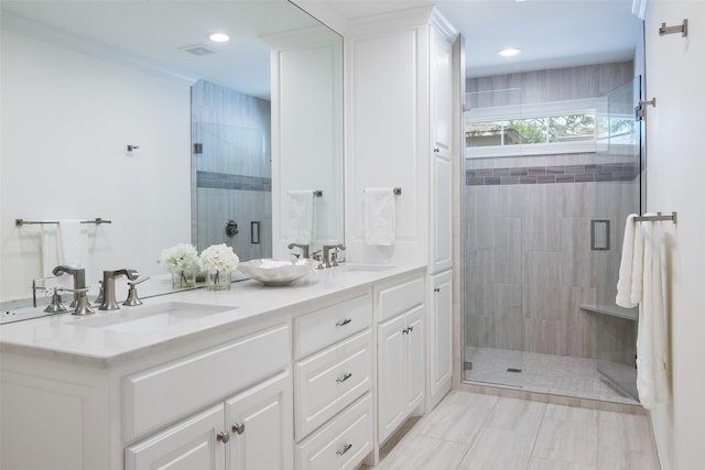 4684 Belclaire Ave, Highland Park, TX 75209 - full bathroom with a stall shower, double vanity, and recessed lighting