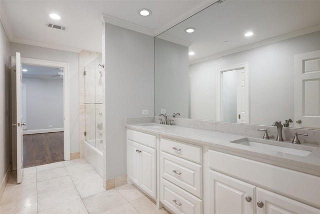4684 Belclaire Ave, Highland Park, TX 75209 - bathroom featuring ornamental molding, double vanity, recessed lighting, bath / shower combo with glass door, and baseboards