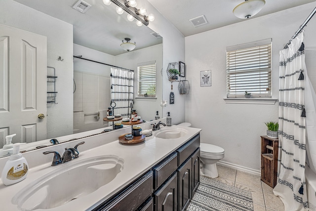 2829 Flint Rock Dr, Fort Worth, TX 76131 - bathroom with toilet, double vanity, tile patterned flooring, and curtained shower