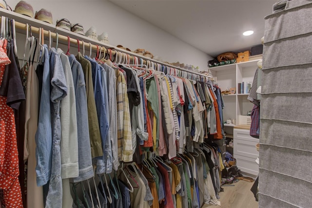 1201 Oakhurst Dr, Southlake, TX 76092 - walk in closet featuring wood finished floors
