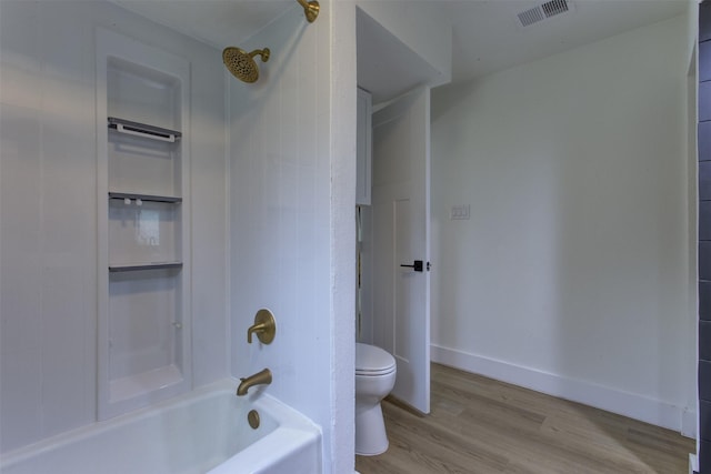 1201 Oakhurst Dr, Southlake, TX 76092 - full bathroom with toilet, wood finished floors, shower / bath combination, and baseboards