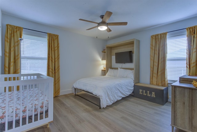 1201 Oakhurst Dr, Southlake, TX 76092 - bedroom featuring wood finished floors, baseboards, and a ceiling fan