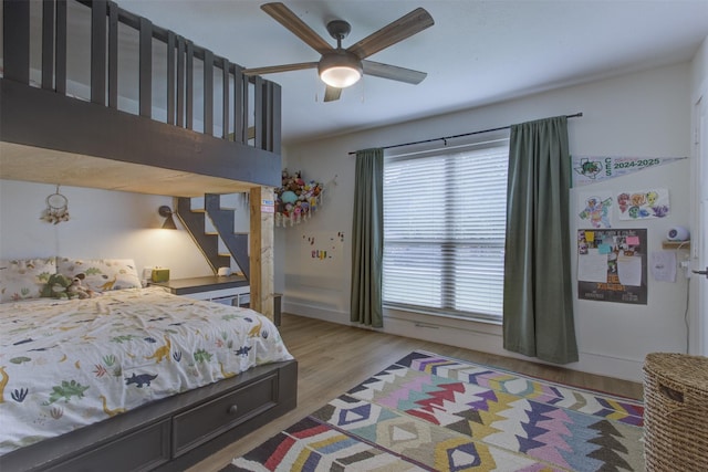 1201 Oakhurst Dr, Southlake, TX 76092 - bedroom with light wood-style flooring and ceiling fan