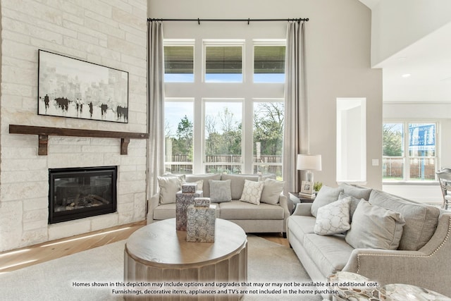 1422 Terrain Rd, Midlothian, TX 76065 - living area featuring a stone fireplace and a high ceiling
