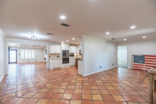 4624 County Road 206, Breckenridge, TX 76424 - kitchen with open floor plan, crown molding, double oven, baseboards, and light tile patterned flooring