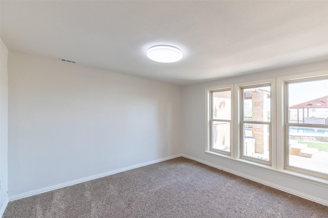 4624 County Road 206, Breckenridge, TX 76424 - unfurnished room with carpet flooring and baseboards