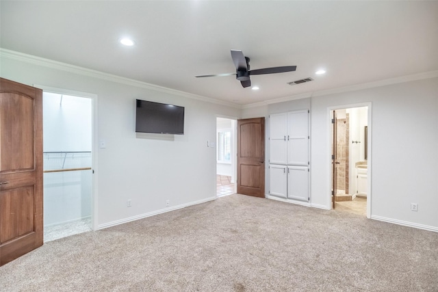 4624 County Road 206, Breckenridge, TX 76424 - unfurnished bedroom with crown molding, recessed lighting, carpet flooring, baseboards, and ensuite bathroom
