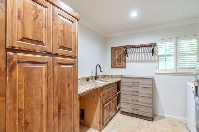 4624 County Road 206, Breckenridge, TX 76424 - laundry area featuring cabinet space, crown molding, baseboards, and light tile patterned flooring
