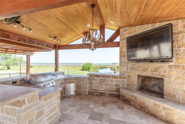 4624 County Road 206, Breckenridge, TX 76424 - view of patio / terrace with an outdoor stone fireplace