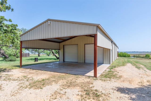 4624 County Road 206, Breckenridge, TX 76424 - garage with a detached garage