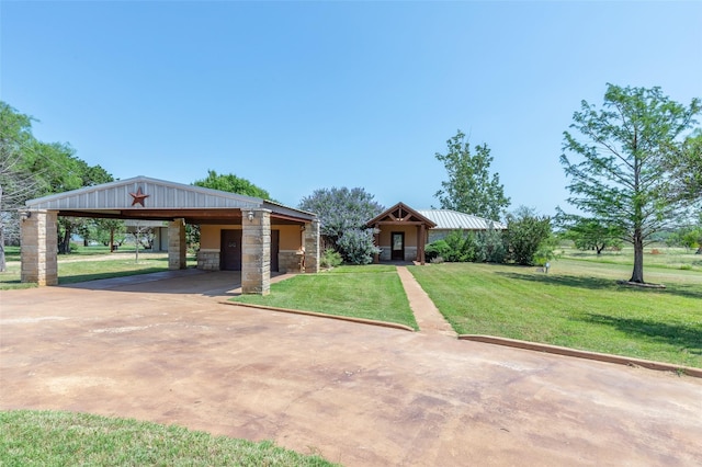 4624 County Road 206, Breckenridge, TX 76424 - view of front of house with concrete driveway, a front yard, and stone siding