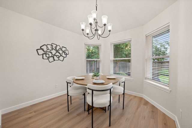 28 Alamosa Dr, Trophy Club, TX 76262 - dining area with light wood-style flooring, baseboards, and a chandelier