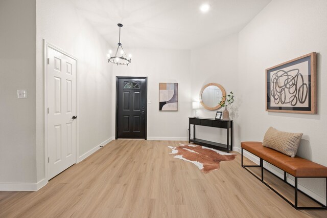 28 Alamosa Dr, Trophy Club, TX 76262 - foyer featuring a chandelier, light wood finished floors, and baseboards