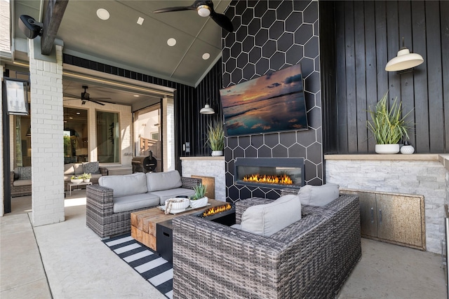 1525 Langford Ln, Celina, TX 75009 - view of patio / terrace featuring ceiling fan and an outdoor living space with a fireplace