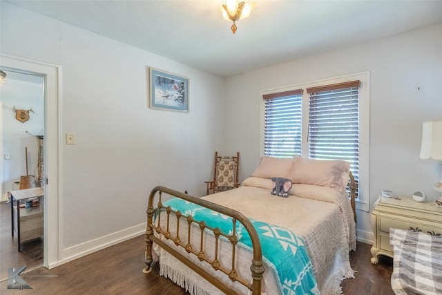 202 E Ross St, Rising Star, TX 76471 - bedroom featuring wood finished floors and baseboards