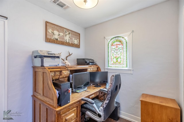 202 E Ross St, Rising Star, TX 76471 - office area featuring baseboards and wood finished floors
