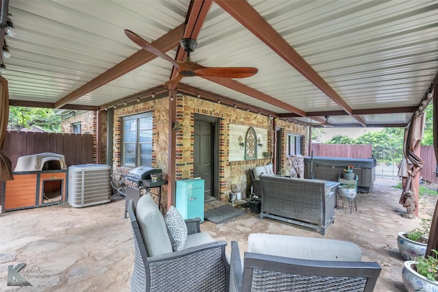 202 E Ross St, Rising Star, TX 76471 - view of patio with a hot tub, a ceiling fan, grilling area, central AC unit, and an outdoor hangout area