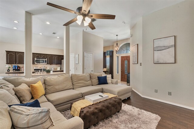 2700 Rochelle Dr, Mckinney, TX 75070 - living area featuring dark wood-style floors, a ceiling fan, baseboards, a chandelier, and recessed lighting