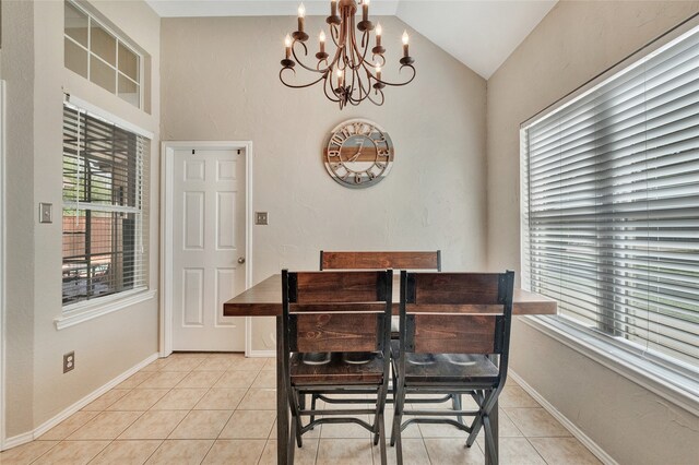 2700 Rochelle Dr, Mckinney, TX 75070 - dining space with a chandelier, light tile patterned flooring, vaulted ceiling, and baseboards