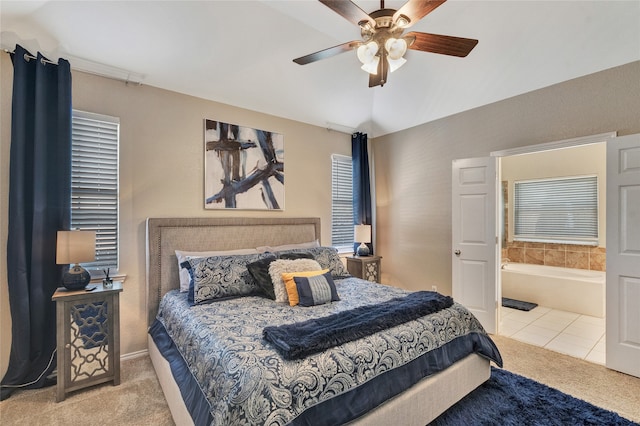 2700 Rochelle Dr, Mckinney, TX 75070 - carpeted bedroom with ensuite bath, a ceiling fan, and tile patterned flooring