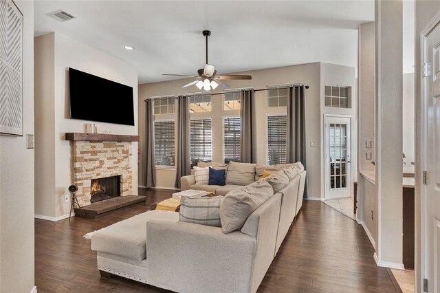 2700 Rochelle Dr, Mckinney, TX 75070 - living area featuring dark wood-type flooring, ceiling fan, a stone fireplace, baseboards, and recessed lighting