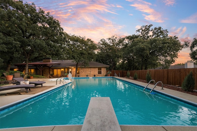 5909 Shady Hill Ln, Arlington, TX 76016 - view of swimming pool featuring a fenced backyard, a patio, and a diving board