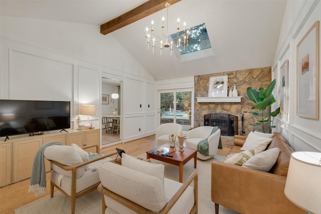 5909 Shady Hill Ln, Arlington, TX 76016 - living room with a decorative wall, beamed ceiling, light wood finished floors, high vaulted ceiling, and a stone fireplace