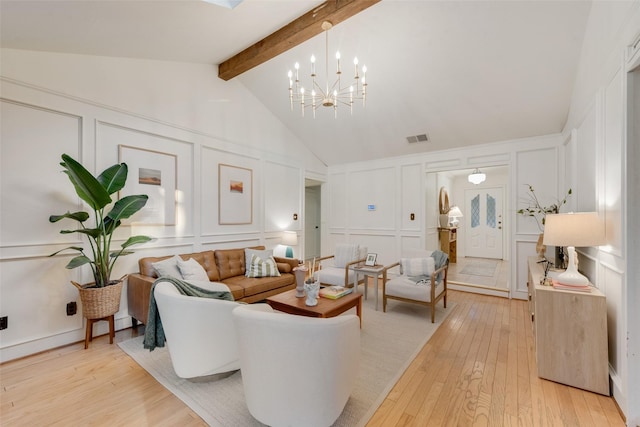 5909 Shady Hill Ln, Arlington, TX 76016 - living room with a decorative wall, light wood-style flooring, beamed ceiling, a chandelier, and high vaulted ceiling