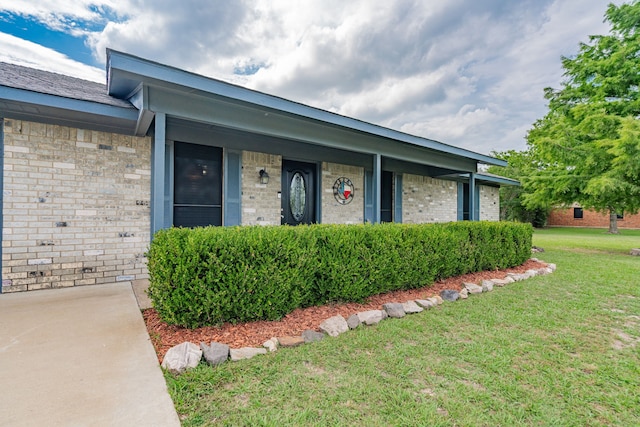 1100 Cartwright Ln, Kaufman, TX 75142 - view of front of property with a front yard and brick siding