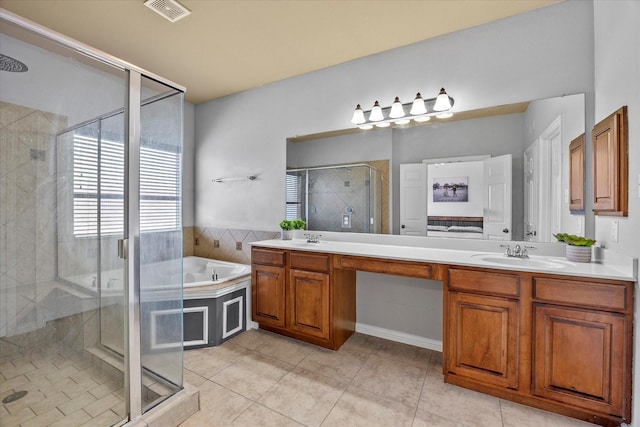 204 Leonard Way, Fate, TX 75087 - full bath featuring a stall shower, double vanity, a bath, and tile patterned floors