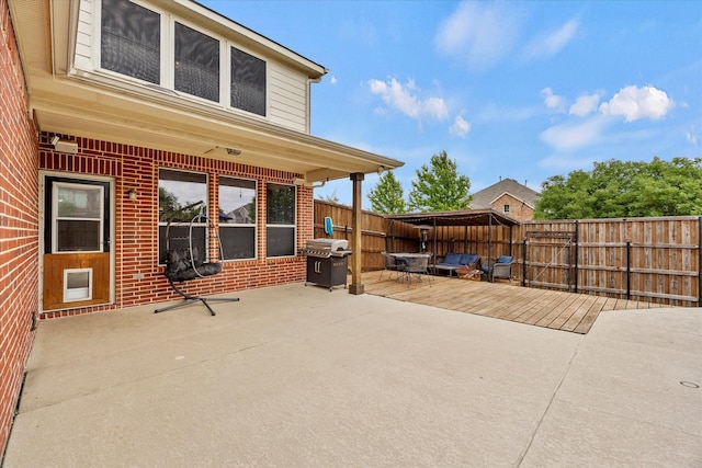 204 Leonard Way, Fate, TX 75087 - fenced backyard with a deck, area for grilling, and a patio area