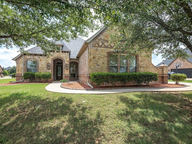 901 Egan Way Ct, Burleson, TX 76028 - view of front facade featuring stone siding and a front yard