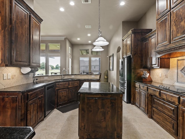 901 Egan Way Ct, Burleson, TX 76028 - kitchen featuring dishwasher, a sink, freestanding refrigerator, recessed lighting, and a kitchen island