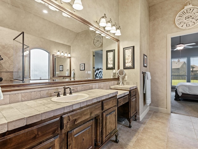 901 Egan Way Ct, Burleson, TX 76028 - bathroom with ensuite bathroom, vanity, baseboards, a ceiling fan, and tile patterned flooring