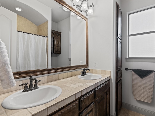 901 Egan Way Ct, Burleson, TX 76028 - bathroom featuring double vanity, tile patterned floors, and a shower with shower curtain