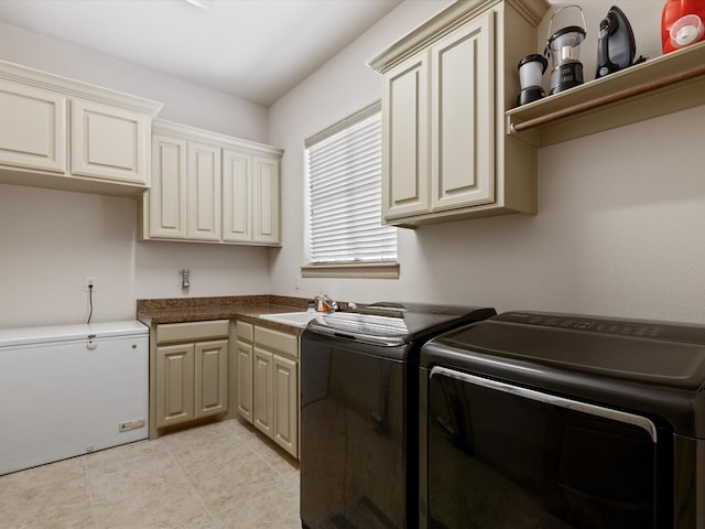 901 Egan Way Ct, Burleson, TX 76028 - laundry room featuring independent washer and dryer, cabinet space, and light tile patterned flooring