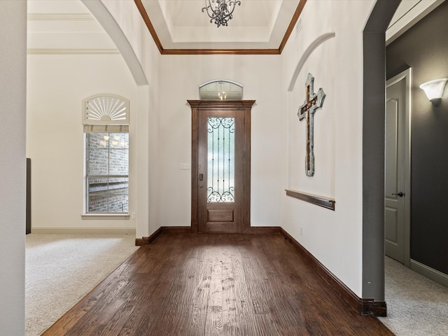 901 Egan Way Ct, Burleson, TX 76028 - foyer entrance with arched walkways, wood finished floors, baseboards, and crown molding