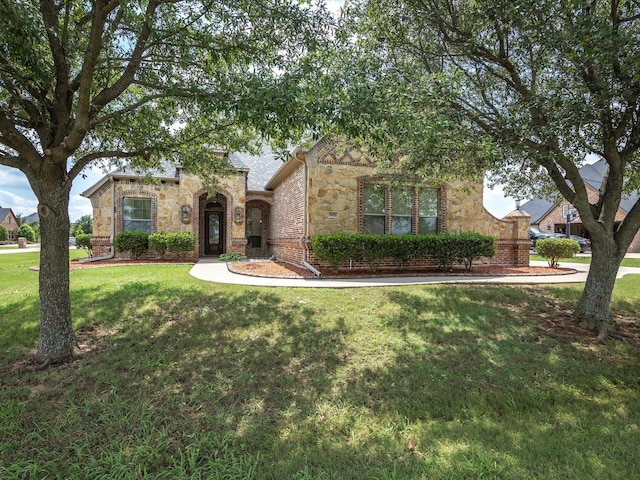 901 Egan Way Ct, Burleson, TX 76028 - view of front facade with stone siding and a front yard