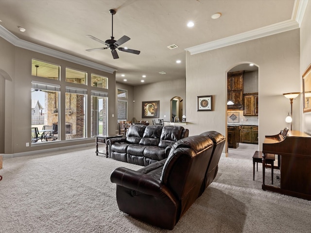 901 Egan Way Ct, Burleson, TX 76028 - living area featuring arched walkways, crown molding, light colored carpet, recessed lighting, and ceiling fan