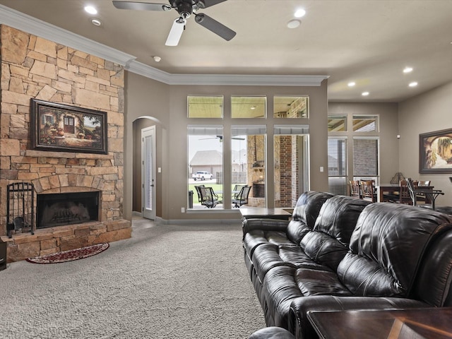 901 Egan Way Ct, Burleson, TX 76028 - living area featuring ceiling fan, carpet flooring, ornamental molding, arched walkways, and healthy amount of natural light