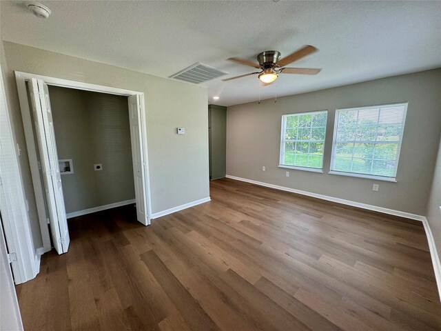 924 Gurley Ln, Waco, TX 76706 - unfurnished bedroom featuring wood finished floors, baseboards, and a ceiling fan