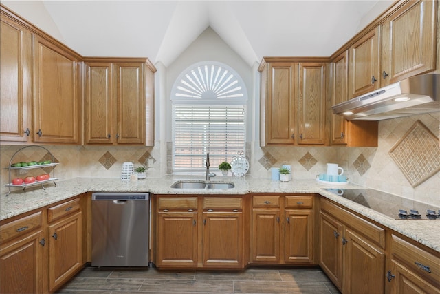 10105 Hunter Run, Frisco, TX 75035 - kitchen featuring stainless steel dishwasher, under cabinet range hood, black electric cooktop, vaulted ceiling, and tasteful backsplash