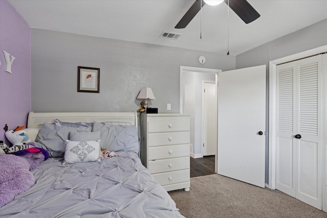1133 Harris Ave, Hurst, TX 76053 - bedroom featuring carpet, a closet, and a ceiling fan