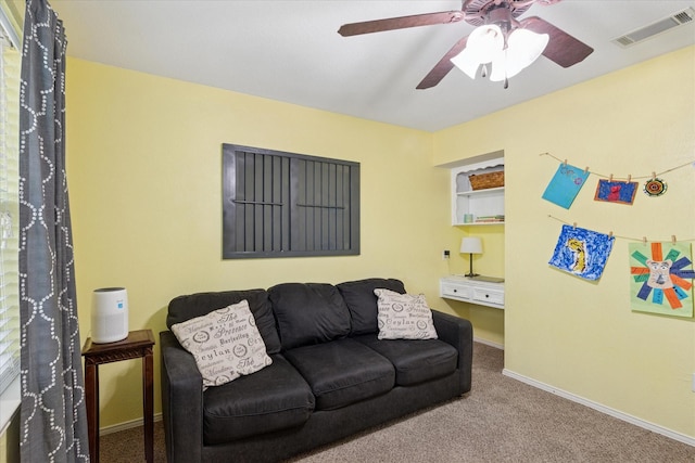 1133 Harris Ave, Hurst, TX 76053 - living room featuring carpet flooring, ceiling fan, and baseboards