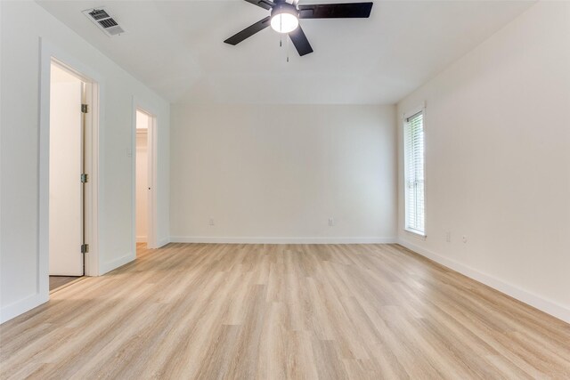 1601 Elk Grove Dr, Richardson, TX 75081 - spare room with light wood finished floors, a ceiling fan, and baseboards
