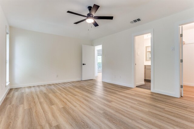 1601 Elk Grove Dr, Richardson, TX 75081 - unfurnished room with a ceiling fan, light wood-style floors, and baseboards