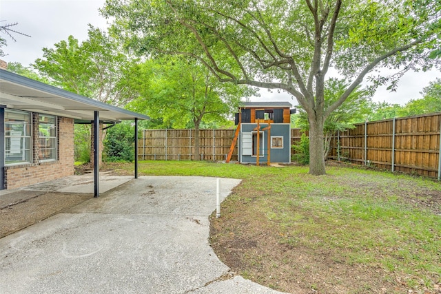 1601 Elk Grove Dr, Richardson, TX 75081 - view of yard with a patio area and an outdoor structure