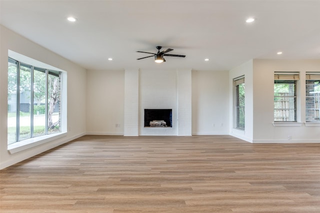 1601 Elk Grove Dr, Richardson, TX 75081 - unfurnished living room featuring healthy amount of natural light, recessed lighting, ceiling fan, and baseboards