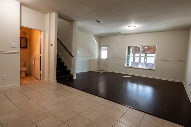 3412 Spruce St, Royse City, TX 75189 - entrance foyer with stairs, baseboards, and tile patterned floors